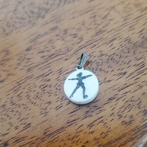 Elegant Small Scrimshaw Ice Skater Pendant....
